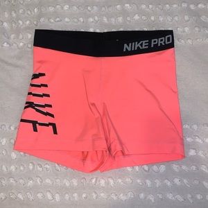Salmon Nike Pro shorts